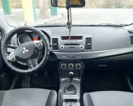 Черный Мицубиси Лансер, объемом двигателя 1.97 л и пробегом 300 тыс. км за 6800 $, фото 5 на Automoto.ua