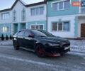 Чорний Міцубісі Lancer, об'ємом двигуна 1.8 л та пробігом 138 тис. км за 6777 $, фото 4 на Automoto.ua