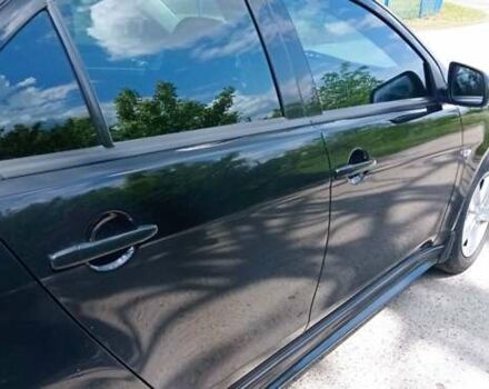 Чорний Міцубісі Lancer, об'ємом двигуна 2 л та пробігом 49 тис. км за 12500 $, фото 41 на Automoto.ua