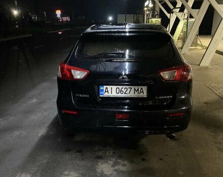 Черный Мицубиси Лансер, объемом двигателя 1.8 л и пробегом 220 тыс. км за 5500 $, фото 2 на Automoto.ua
