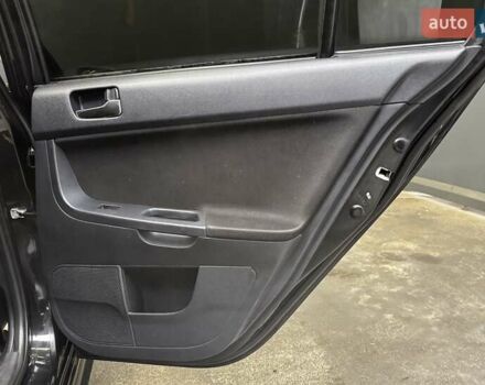 Черный Мицубиси Лансер, объемом двигателя 1.8 л и пробегом 362 тыс. км за 5500 $, фото 31 на Automoto.ua