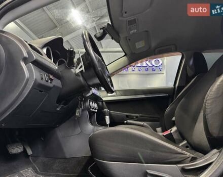 Черный Мицубиси Лансер, объемом двигателя 1.8 л и пробегом 362 тыс. км за 5500 $, фото 18 на Automoto.ua