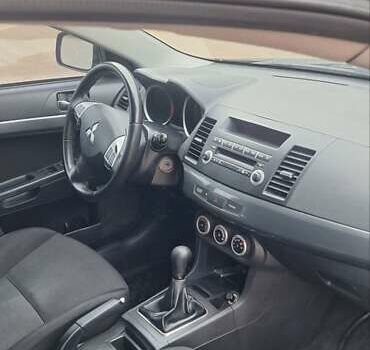 Чорний Міцубісі Lancer, об'ємом двигуна 1.8 л та пробігом 213 тис. км за 6200 $, фото 1 на Automoto.ua