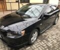 Чорний Міцубісі Lancer, об'ємом двигуна 1.8 л та пробігом 141 тис. км за 8700 $, фото 1 на Automoto.ua