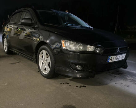 Черный Мицубиси Лансер, объемом двигателя 1.8 л и пробегом 220 тыс. км за 5500 $, фото 13 на Automoto.ua