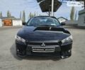 Чорний Міцубісі Lancer, об'ємом двигуна 1.8 л та пробігом 157 тис. км за 6650 $, фото 1 на Automoto.ua