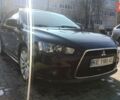 Черный Мицубиси Лансер, объемом двигателя 1.8 л и пробегом 220 тыс. км за 8000 $, фото 1 на Automoto.ua
