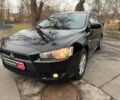 Чорний Міцубісі Lancer, об'ємом двигуна 1.8 л та пробігом 269 тис. км за 6390 $, фото 1 на Automoto.ua