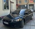 Черный Мицубиси Лансер, объемом двигателя 1.8 л и пробегом 239 тыс. км за 5999 $, фото 1 на Automoto.ua