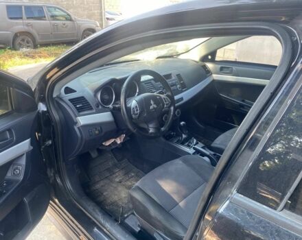 Мицубиси Лансер 2009 в Белой Церкве на Automoto.ua Черный Мицубиси Лансер, объемом двигателя 1.8 л и пробегом 180 тыс. км за 1600 $, фото 13 на Automoto.ua