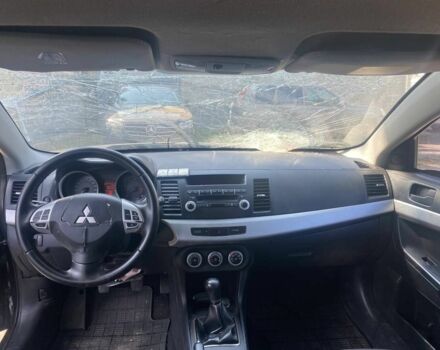 Мицубиси Лансер 2009 в Белой Церкве на Automoto.ua Черный Мицубиси Лансер, объемом двигателя 1.8 л и пробегом 180 тыс. км за 1600 $, фото 9 на Automoto.ua