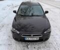 Черный Мицубиси Лансер, объемом двигателя 2 л и пробегом 270 тыс. км за 6100 $, фото 1 на Automoto.ua