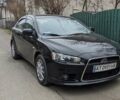 Черный Мицубиси Лансер, объемом двигателя 1.8 л и пробегом 210 тыс. км за 7300 $, фото 6 на Automoto.ua