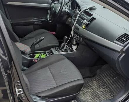 Черный Мицубиси Лансер, объемом двигателя 1.8 л и пробегом 210 тыс. км за 7300 $, фото 5 на Automoto.ua