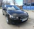 Черный Мицубиси Лансер, объемом двигателя 2 л и пробегом 279 тыс. км за 6200 $, фото 1 на Automoto.ua