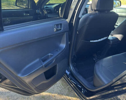 Мицубиси Лансер 2011 в Недригайлове на Automoto.ua Черный Мицубиси Лансер, объемом двигателя 1.8 л и пробегом 354 тыс. км за 8000 $, фото 7 на Automoto.ua