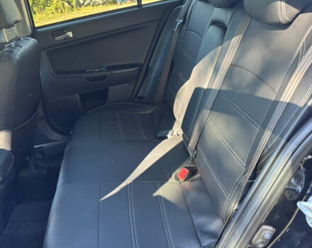 Мицубиси Лансер 2011 в Недригайлове на Automoto.ua Черный Мицубиси Лансер, объемом двигателя 1.8 л и пробегом 354 тыс. км за 8000 $, фото 8 на Automoto.ua