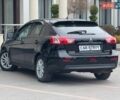 Чорний Міцубісі Lancer, об'ємом двигуна 1.8 л та пробігом 263 тис. км за 6999 $, фото 13 на Automoto.ua