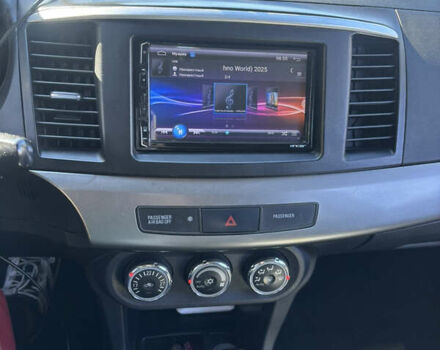 Мицубиси Лансер 2011 в Недригайлове на Automoto.ua Черный Мицубиси Лансер, объемом двигателя 1.8 л и пробегом 354 тыс. км за 8000 $, фото 12 на Automoto.ua