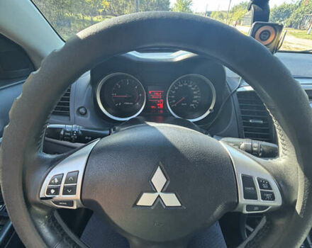 Мицубиси Лансер 2011 в Недригайлове на Automoto.ua Черный Мицубиси Лансер, объемом двигателя 1.8 л и пробегом 354 тыс. км за 8000 $, фото 13 на Automoto.ua