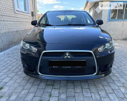 Чорний Міцубісі Lancer, об'ємом двигуна 1.6 л та пробігом 187 тис. км за 8100 $, фото 7 на Automoto.ua