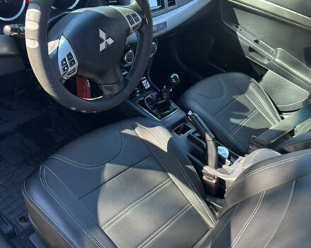 Мицубиси Лансер 2011 в Недригайлове на Automoto.ua Черный Мицубиси Лансер, объемом двигателя 1.8 л и пробегом 354 тыс. км за 8000 $, фото 10 на Automoto.ua