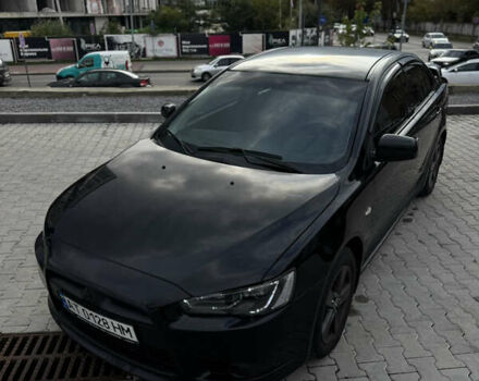 Черный Мицубиси Лансер, объемом двигателя 1.59 л и пробегом 187 тыс. км за 7000 $, фото 6 на Automoto.ua