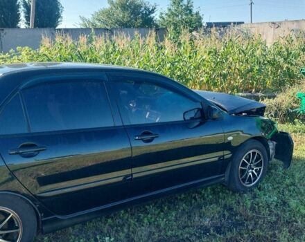 Чорний Міцубісі Lancer, об'ємом двигуна 1.6 л та пробігом 229 тис. км за 2500 $, фото 6 на Automoto.ua