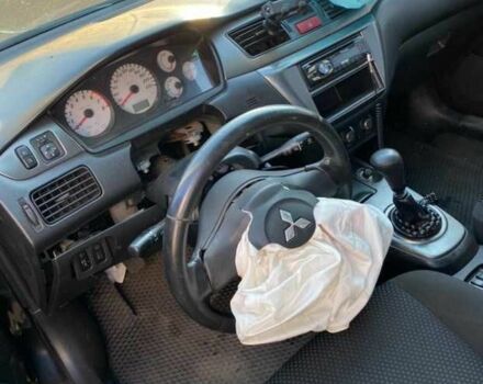 Чорний Міцубісі Lancer, об'ємом двигуна 1.6 л та пробігом 229 тис. км за 2500 $, фото 7 на Automoto.ua