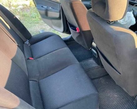 Чорний Міцубісі Lancer, об'ємом двигуна 1.6 л та пробігом 229 тис. км за 2500 $, фото 8 на Automoto.ua