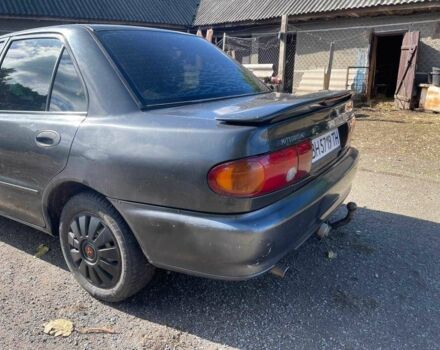Чорний Міцубісі Lancer, об'ємом двигуна 1.3 л та пробігом 350 тис. км за 2300 $, фото 4 на Automoto.ua