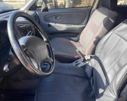 Чорний Міцубісі Lancer, об'ємом двигуна 1.3 л та пробігом 350 тис. км за 2300 $, фото 13 на Automoto.ua