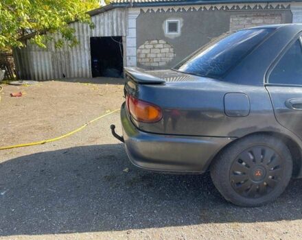 Чорний Міцубісі Lancer, об'ємом двигуна 1.3 л та пробігом 350 тис. км за 2300 $, фото 6 на Automoto.ua