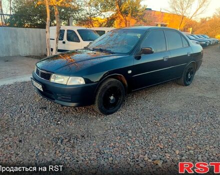 Чорний Міцубісі Lancer, об'ємом двигуна 1.3 л та пробігом 250 тис. км за 2500 $, фото 2 на Automoto.ua