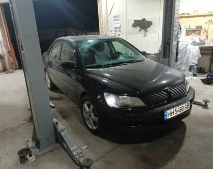Чорний Міцубісі Lancer, об'ємом двигуна 2 л та пробігом 270 тис. км за 3800 $, фото 4 на Automoto.ua