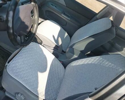 Черный Мицубиси Лансер, объемом двигателя 2 л и пробегом 270 тыс. км за 3800 $, фото 8 на Automoto.ua