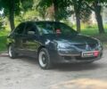 Черный Мицубиси Лансер, объемом двигателя 1.6 л и пробегом 270 тыс. км за 6490 $, фото 2 на Automoto.ua