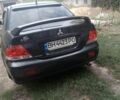 Черный Мицубиси Лансер, объемом двигателя 1.6 л и пробегом 550 тыс. км за 4500 $, фото 2 на Automoto.ua
