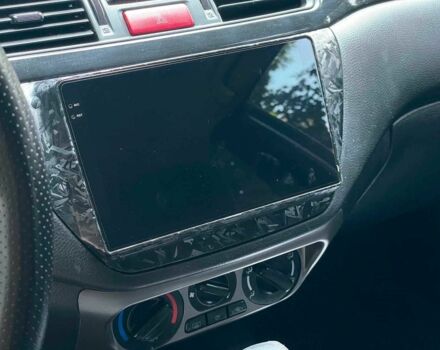 Чорний Міцубісі Lancer, об'ємом двигуна 1.6 л та пробігом 270 тис. км за 6490 $, фото 15 на Automoto.ua