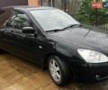 Черный Мицубиси Лансер, объемом двигателя 1.58 л и пробегом 300 тыс. км за 3999 $, фото 1 на Automoto.ua