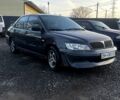 Чорний Міцубісі Lancer, об'ємом двигуна 2 л та пробігом 1850 тис. км за 2700 $, фото 2 на Automoto.ua