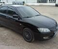 Чорний Міцубісі Lancer, об'ємом двигуна 1.6 л та пробігом 290 тис. км за 3500 $, фото 1 на Automoto.ua