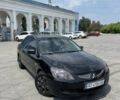 Черный Мицубиси Лансер, объемом двигателя 1.6 л и пробегом 250 тыс. км за 3300 $, фото 1 на Automoto.ua