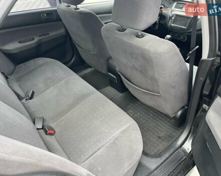 Чорний Міцубісі Lancer, об'ємом двигуна 1.58 л та пробігом 290 тис. км за 3900 $, фото 20 на Automoto.ua