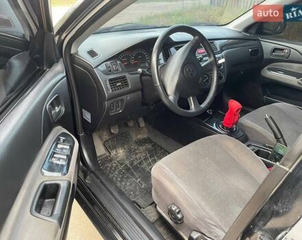 Черный Мицубиси Лансер, объемом двигателя 1.58 л и пробегом 172 тыс. км за 5700 $, фото 5 на Automoto.ua