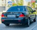 Черный Мицубиси Лансер, объемом двигателя 1.58 л и пробегом 260 тыс. км за 2500 $, фото 1 на Automoto.ua