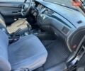 Мицубиси Лансер 2004 в Львове на Automoto.ua Черный Мицубиси Лансер, объемом двигателя 1.58 л и пробегом 463 тыс. км за 3900 $, фото 38 на Automoto.ua