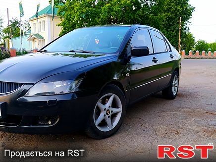 Чорний Міцубісі Lancer, об'ємом двигуна 2 л та пробігом 225 тис. км за 2800 $, фото 3 на Automoto.ua