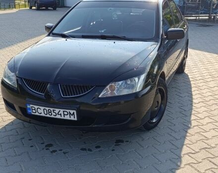 Мицубиси Лансер 2004 в Дрогобыче на Automoto.ua Черный Мицубиси Лансер, объемом двигателя 1.6 л и пробегом 260 тыс. км за 3750 $, фото 6 на Automoto.ua