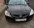 Чорний Міцубісі Lancer, об'ємом двигуна 1.6 л та пробігом 300 тис. км за 4459 $, фото 2 на Automoto.ua